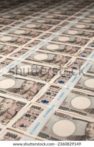 Neatly Laid Out Stacks of Ten Thousand Yen Bills