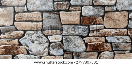 A neatly stacked stone structure (often referred to as a cairn, dry stone wall, or rock stack) is a deliberate arrangement of stones balanced or layered precisely on top of one another without the use of mortar