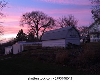 A Nebraska Sunset With A Barn View.