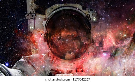 Nebula and galaxies in dark space. Elements of this image furnished by NASA. - Shutterstock ID 1177042267