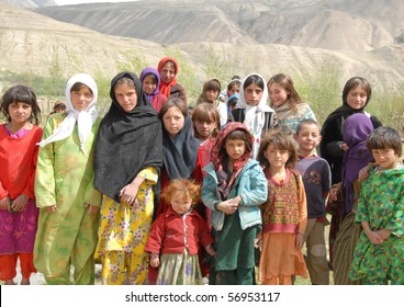 NECHEM, AFGHANISTAN - MAY 28: School Girls Pose Together On May 28, 2010 In Nechem, Afghanistan. A Decade Ago Not A Single Girl In Badakhshan Was In School But Now The Majority Get Primary Education.