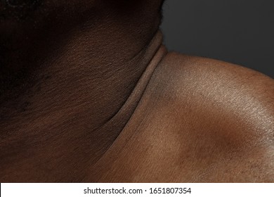 Neck. Detailed Texture Of Human Skin. Close Up Shot Of Young African-american Male Body. Skincare, Bodycare, Healthcare, Hygiene And Medicine Concept. Looks Beauty And Well-kept. Dermatology.