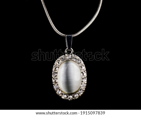 Neckless with Diamond and white stone 