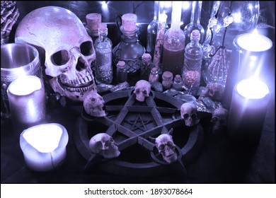 Necromancer's Dark Ritual With Pentagram, Candles And Skulls