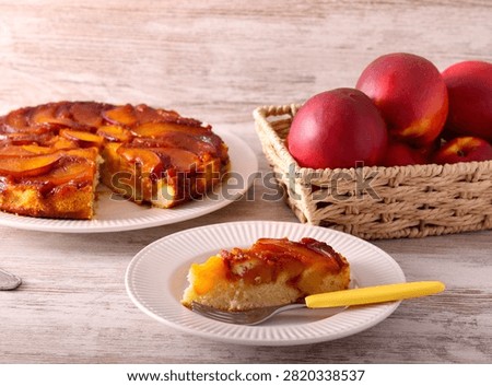 Nectarine upside down cake, sliced and served