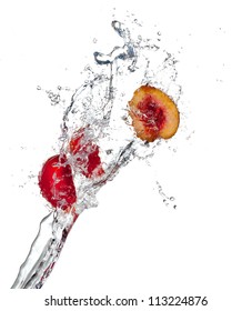 Nectarines in water splash, isolated on white background
