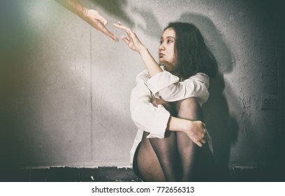 Need Help, Depressed And Frustrated, Supporter Reaching Hand To Sad Woman In The Dark Room, Mental Health Concept.