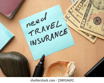 Need Travel Insurance Paper On A Table With Money