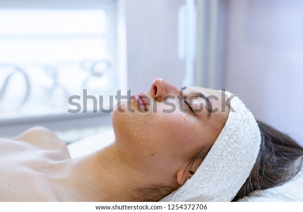 Needle mesotherapy in beauty spa salon or\
clinic. Cosmetics been injected to woman\'s face, close up portrait.\
Needle mesotherapy treatment on a woman\
face.