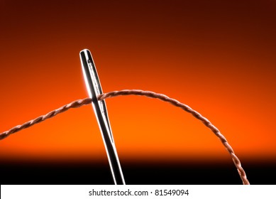 Needle and thread. A beautiful art background. Bible motive.
