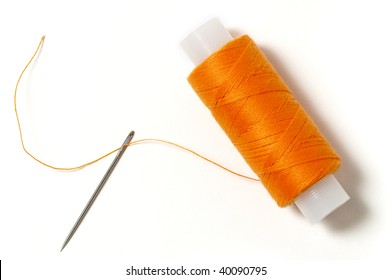 Needle And Thread Isolated Over White Background