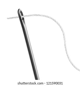 Needle And Thread On A White Background