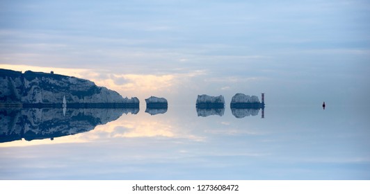 The Needles Isle of Wight, Hampshire stylised with a reflection - Powered by Shutterstock