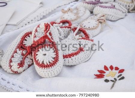 needlework socks for babies