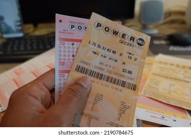 Neenah Wisconsin, USA
August 17, 2022: Powerball, Mega Millions Lottery Tickets , Selective Focus