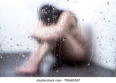 Negative Body Image, Domestic Violence,  Sexual Harassment Or Mental Health Problems Concept. Sad Young Woman Crying And Sitting In Shower. No Self Confidence Or Bad Self Esteem. 