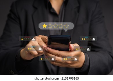 Negative feedback concept. Choosing a 1-star rating review in the survey, poll, or customer satisfaction research. Bad user experience via a smartphone. Customer experience dissatisfied. Poor rating - Shutterstock ID 2151998165