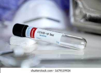 Negative results. Testing for presence of coronavirus. Tube containing a swab sample for COVID-19 that has tested NEGATIVE.