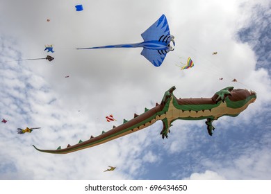 NEGOMBO, SRI LANKA - AUGUST 13, 2017 : Colourful Kites Including A Crocodile And A Sting Ray Fly Above Negombo Beach During The Annual Kite Festival.