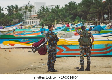 Negombo, Sri Lanka - October 8, 2019: Two Armed Officers Watching The Situation On The Beach Due To Terrorist Thread After Few Months After Bombing Attacks