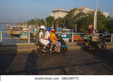 Negombo, Sri Lanka-March 25, 2019: Sri Lankan Mother And School Going Kids Riding On A Scooty At Negombo, Srilanka. 