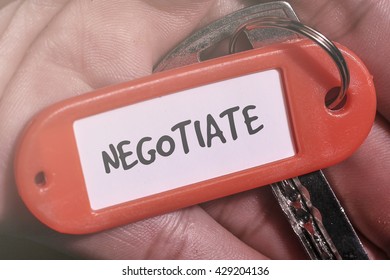 NEGOTIATE Word Written On Key Chain