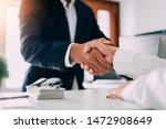 Negotiating business,Image of businessmen Handshaking,Handshake Gesturing People Connection Deal Concept