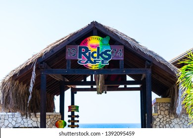 Negril, Jamaica - February 15, 2019: Sign At Entrance To Ricks Cafe, A Famous Sports Bar And Restaurant On The Cliffs Of West End Negril In Westmoreland, For Cliff Diving And Incredible Sunset Views.