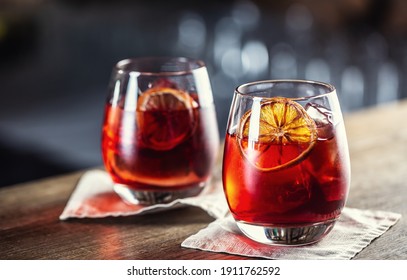 Negroni Classic Cocktail And Gin Short Drink With Sweet Vermouth, Red Bitter Liqueur And Dried Orange Garnish.