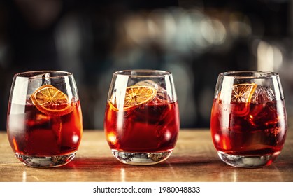 Negroni Classic Cocktail And Gin Short Drink With Sweet Vermouth, Red Bitter Liqueur And Dried Orange Garnish.