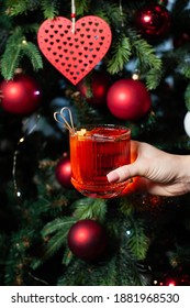 Negroni Cocktail Against The Background Of The Christmas Tree
