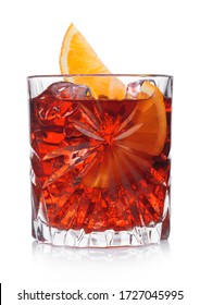 Negroni Cocktail In Crystal Glass With Ice Cubes And Orange Slice On White Background