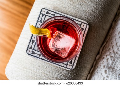 Negroni Cocktail With Lemon Peel And Ice
