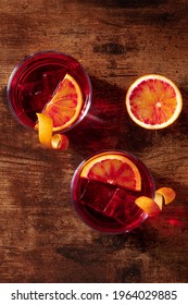 Negroni Orange Cocktail, Shot From Above On A Wooden Table