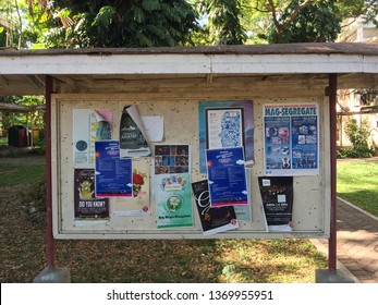 Negros Oriental, Philippines, April 11, 2019: Bulletin boards inside the Silliman University campus in Dumaguete City, with various posters promoting events and other school/community matters.
