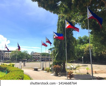 Negros Oriental, Philippines; June 1, 2019: Philippine flags surround a water feature at the Freedom Park in Dumaguete City, in preparation for the Independence Day celebration on June 12.
