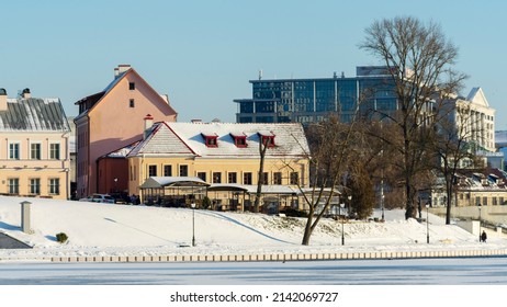 Neighborhood Of Old Houses And Modern Buildings In Winter. Retro Versus Modern Style. Contrast In Architecture. Cityscape Background.