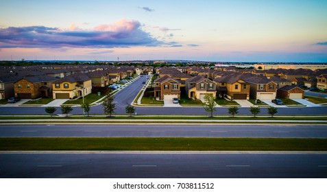 Neighborhood Suburb At Sunset In North Austin Texas Lined Up Brand New Constructed Homes In New Development Near Round Rock