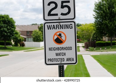 Neighborhood Watch Sign In A Sunny Midwest Suburb.