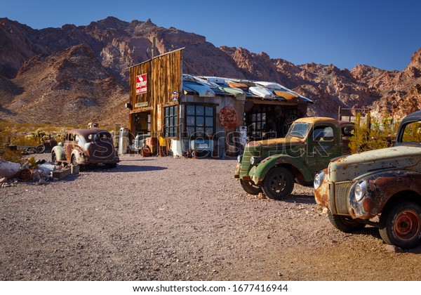 Nelson Ghost Town, Nevada, USA -\
4 October, 2019: old classic cars in Nelson Ghost Town near\
Eldorado Gold Mine, Nelson Cutoff Rd, Searchlight, Nevada,\
USA