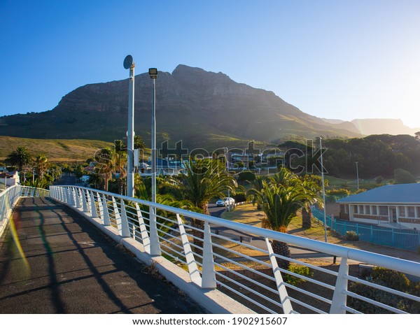 Nelson Mandela Boulevard- Cape\
Town, South Africa - 19-01-2021\
\
View from bridge on Nelson\
Mandela Boulevard bridge. mountains and sunset in\
background.