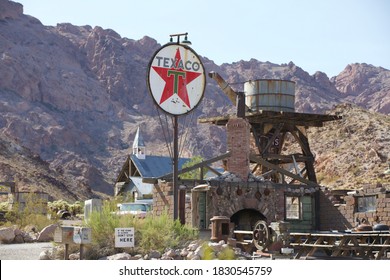 Nelson, NV, USA 10/8/2020 — Abandoned Texaco gas station and a former gold mine in Eldorado Canyon. Near Searchlight, Nevada on State Route 165.