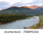 Nenana River at sunrise at Denali National Park, Alaska, USA.  The Nenana River is a tributary of the Tanana River, approximately 140 miles long, in central Alaska in the United States.