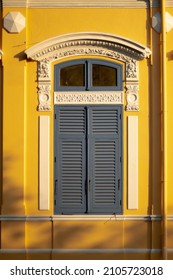 Neo Palladian Architecture Yellow Walls And Gray Window