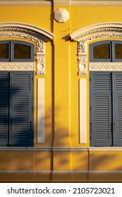 Neo Palladian Architecture Yellow Walls And Gray Window