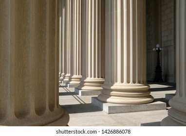 Neoclassical Roman Columns in the Sun - Shutterstock ID 1426886078