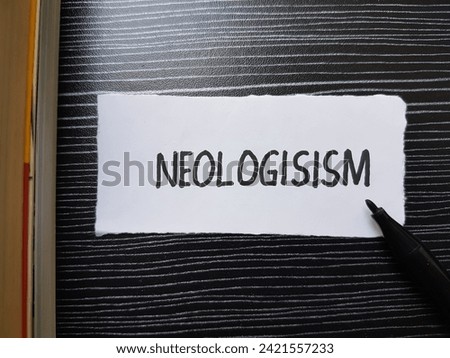 Neologisism  writting on table background.