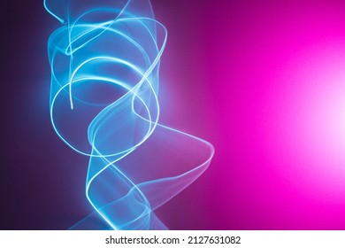 Neon Abstract Led Lines On A Magenta Background. Fluorescent Vaporwave Wallpaper.