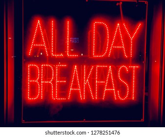 Neon All Day Breakfast Sign Outside Of A Local Diner 