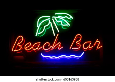 Neon beach bar sign - Powered by Shutterstock